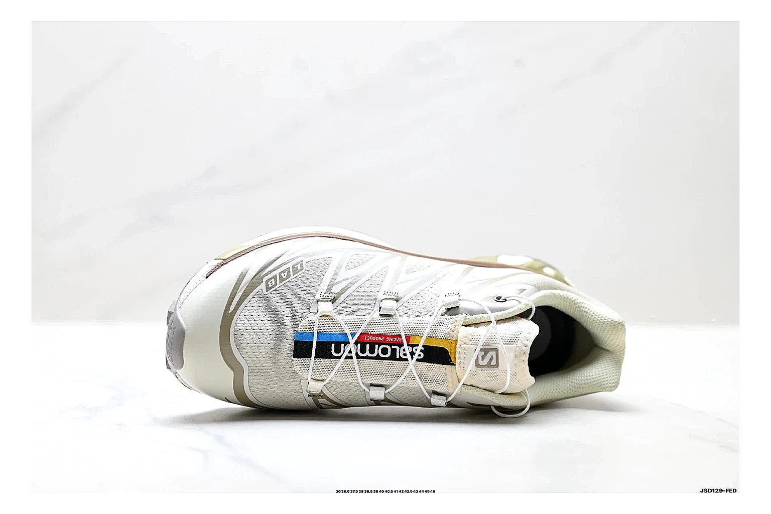 Salomon Xt Runner White Gold QC reference photo showing white mesh trail-runner upper, gold accents, speed-lace style structure, and rugged sole thumbnail 5