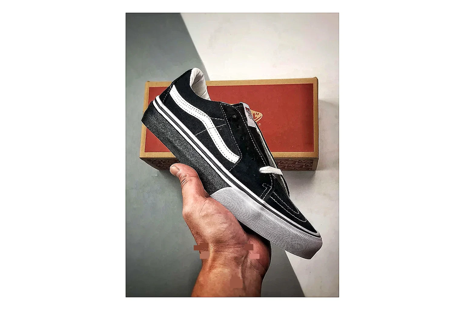 Vans Old Skool Black White QC reference photo showing black canvas-suede low-top upper, white side stripe, padded collar, and classic vulcanized skate sole